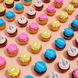 Corporate Cupcakes with Logos featuring vibrant edible logo toppers in various flavors, perfect for corporate events by Crumbs & Doilies